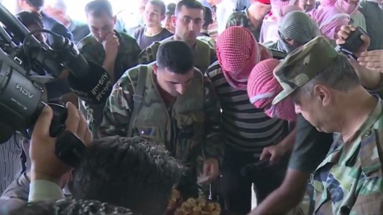 Syrien: Rebellen legen Waffen nieder - Rückkehr zum zivilen Leben 