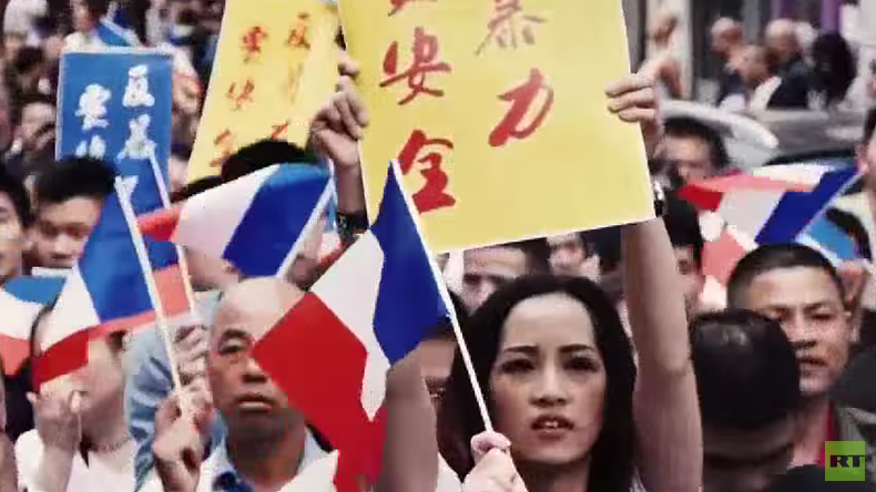 Tausende chinesisch-stämmige Migranten demonstrierten in Paris gegen zunehmende Gewalt. 